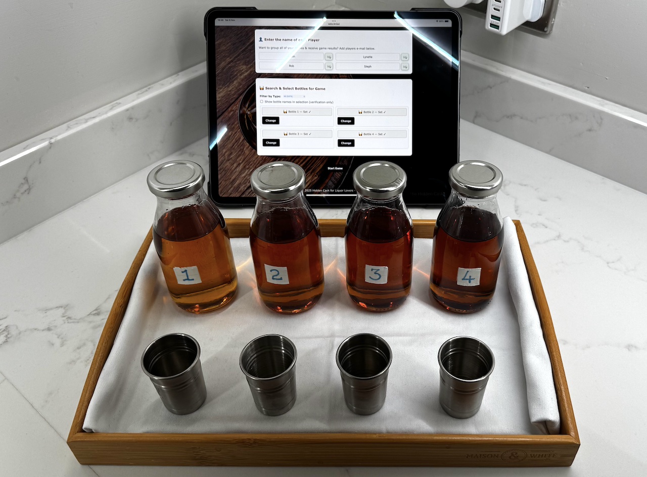 Blind whisky tasting setup with bottles hidden from players